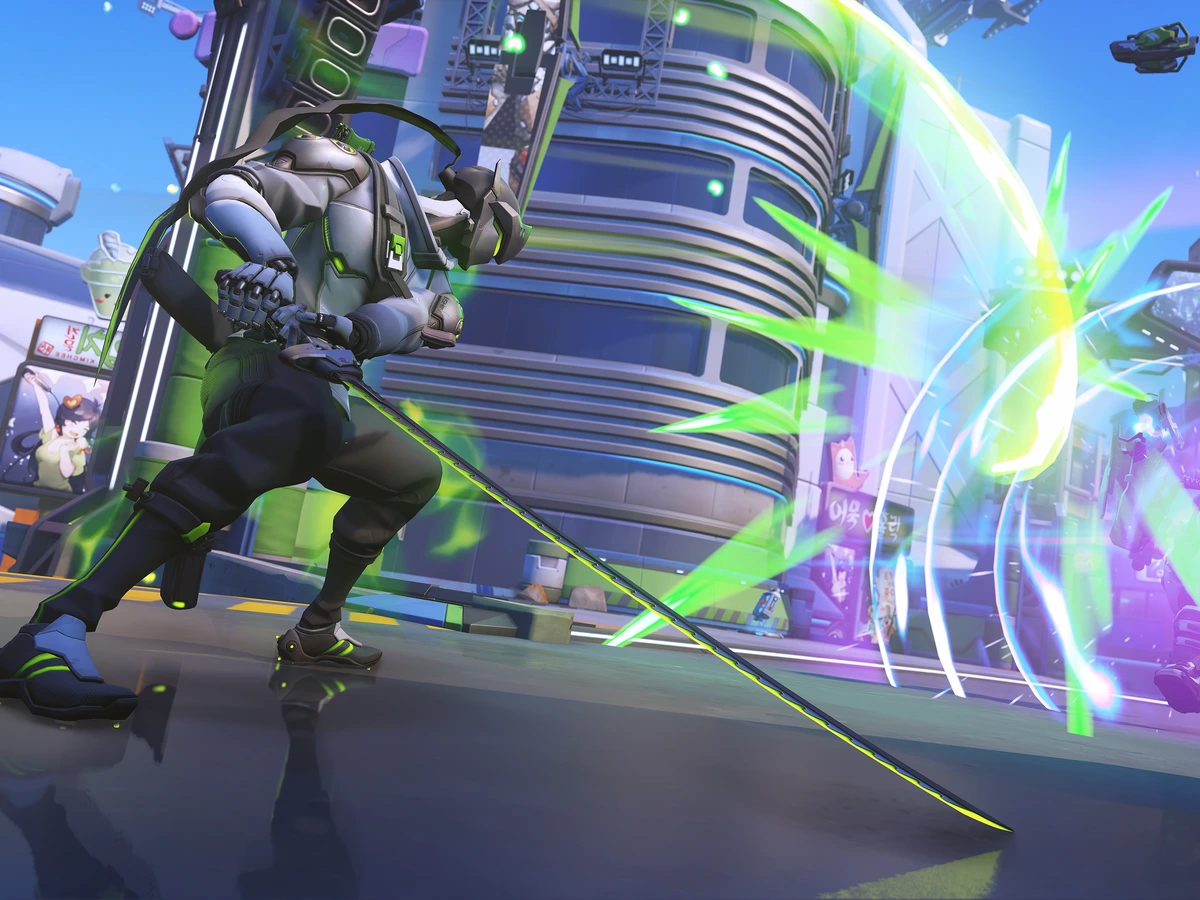 Genji faces a shielded opponent during Stadium combat on a futuristic Overwatch map