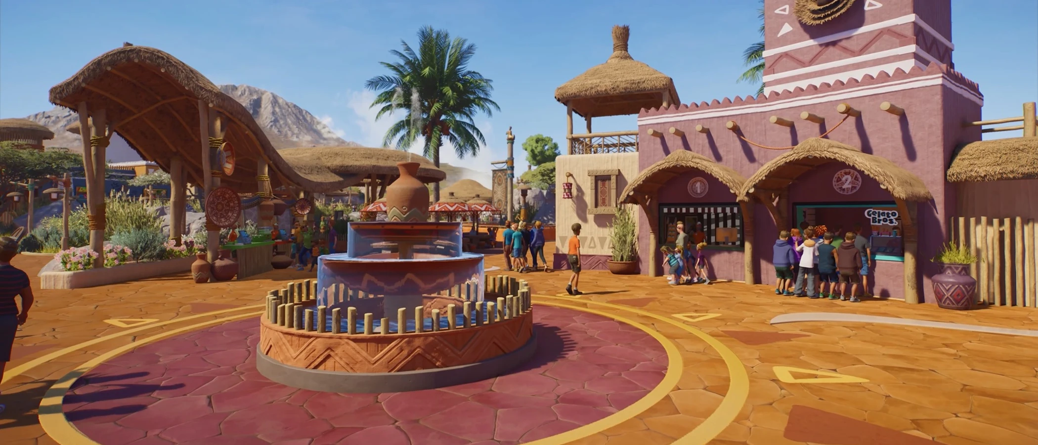 A decorated plaza with shops and visitors in Planet Zoo 2.