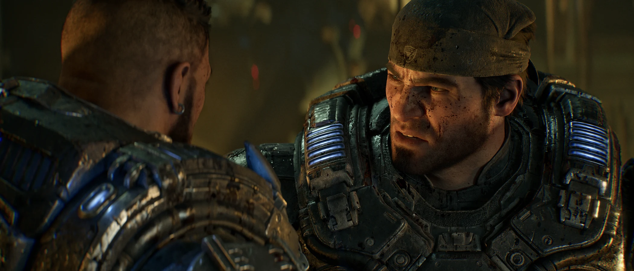 Marcus Fenix and Dominic Santiago face each other in an official Gears of War: E-Day campaign image.