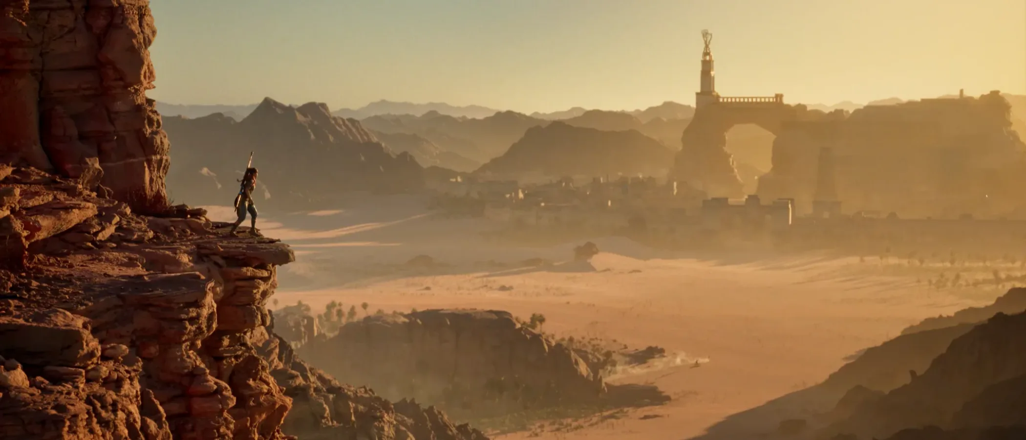A lone traveller stands on a rocky ledge above a sunlit desert valley and distant city.