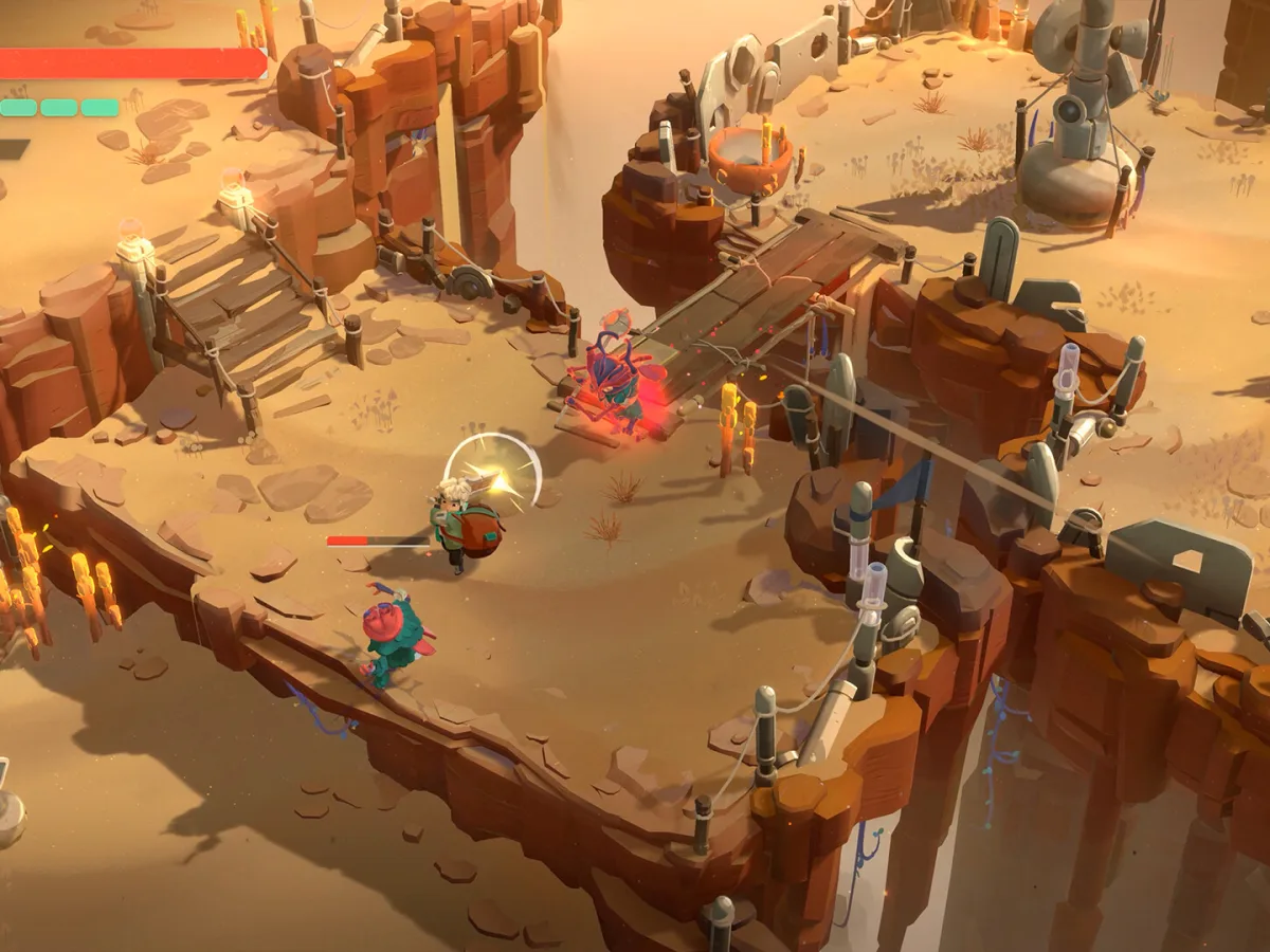 Will fights colourful creatures on a sandstone platform in Moonlighter 2: The Endless Vault.