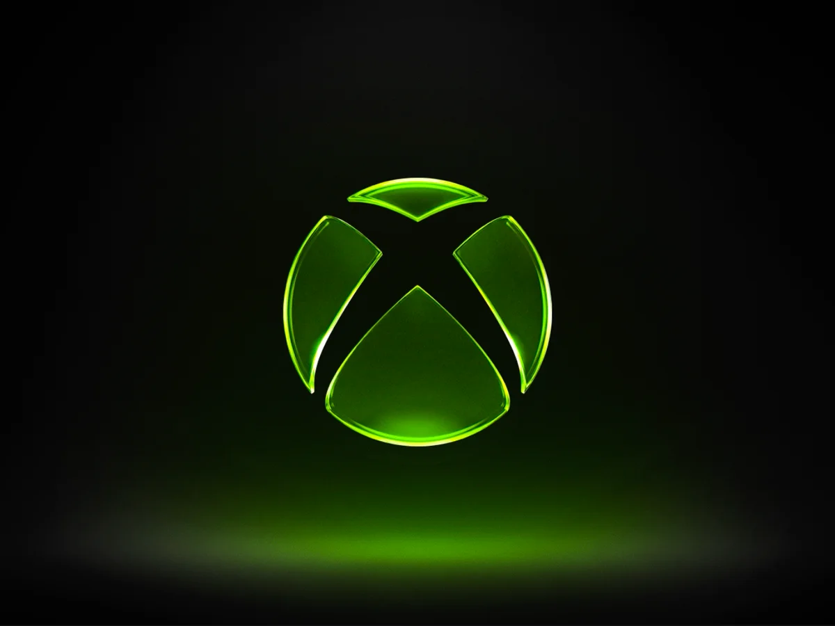 A green Xbox symbol glows against a dark background
