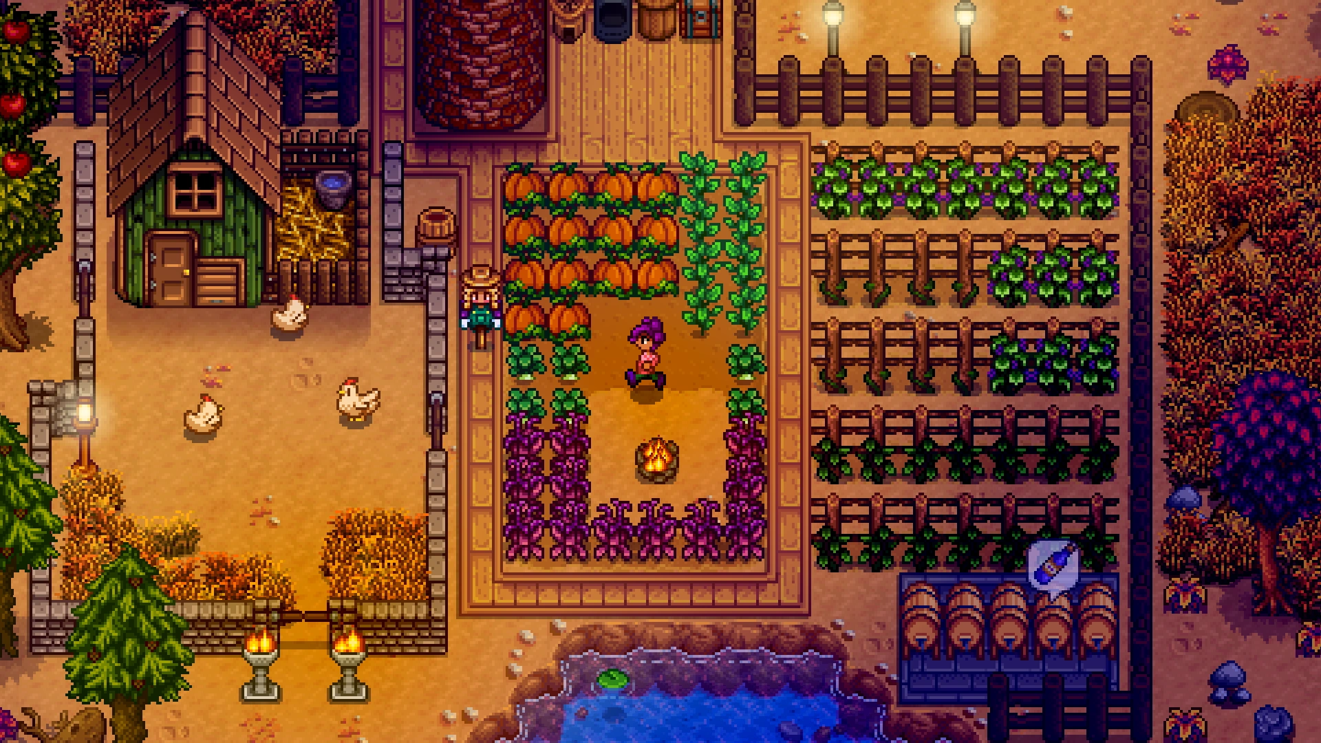 A farmer and chickens beside planted crops on an autumn Stardew Valley farm