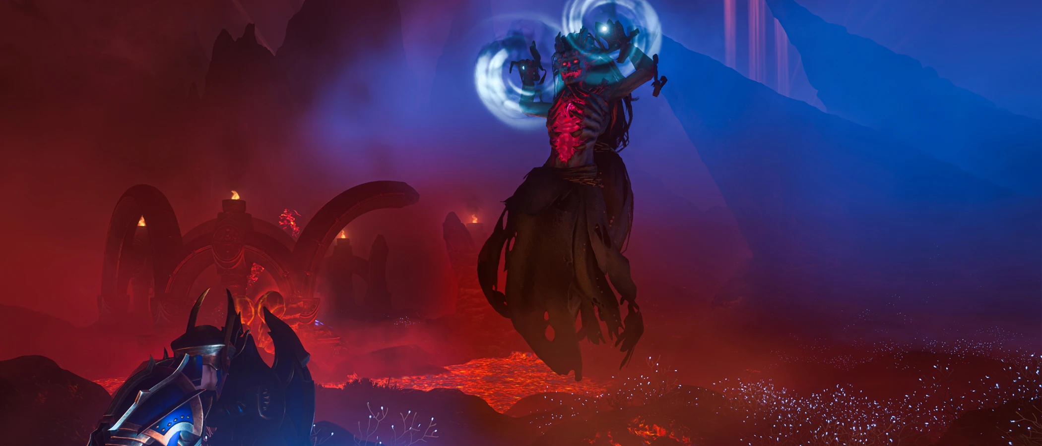 An Enshrouded warrior faces a floating enemy glowing with blue magic.