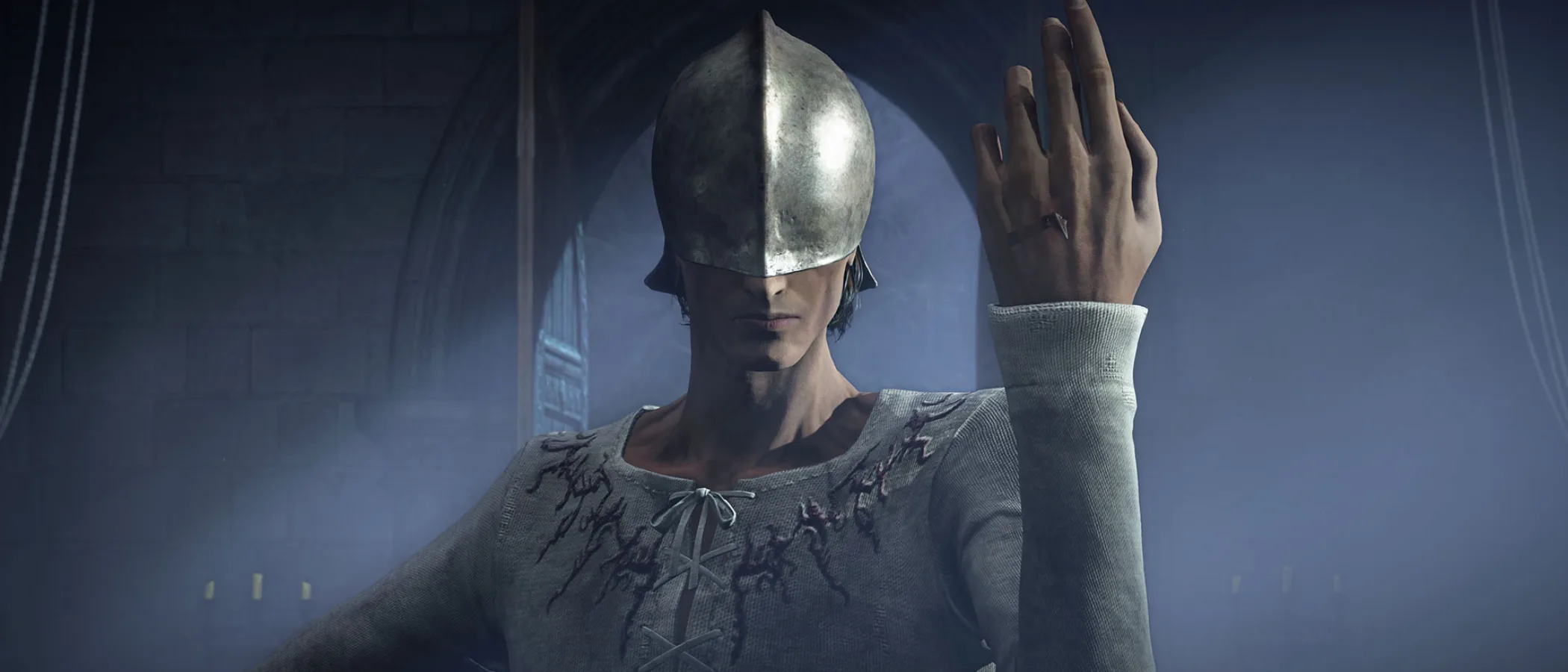 A Bloodsworn wearing a silver mask raises a hand inside a blue-lit stone hall in The Duskbloods.