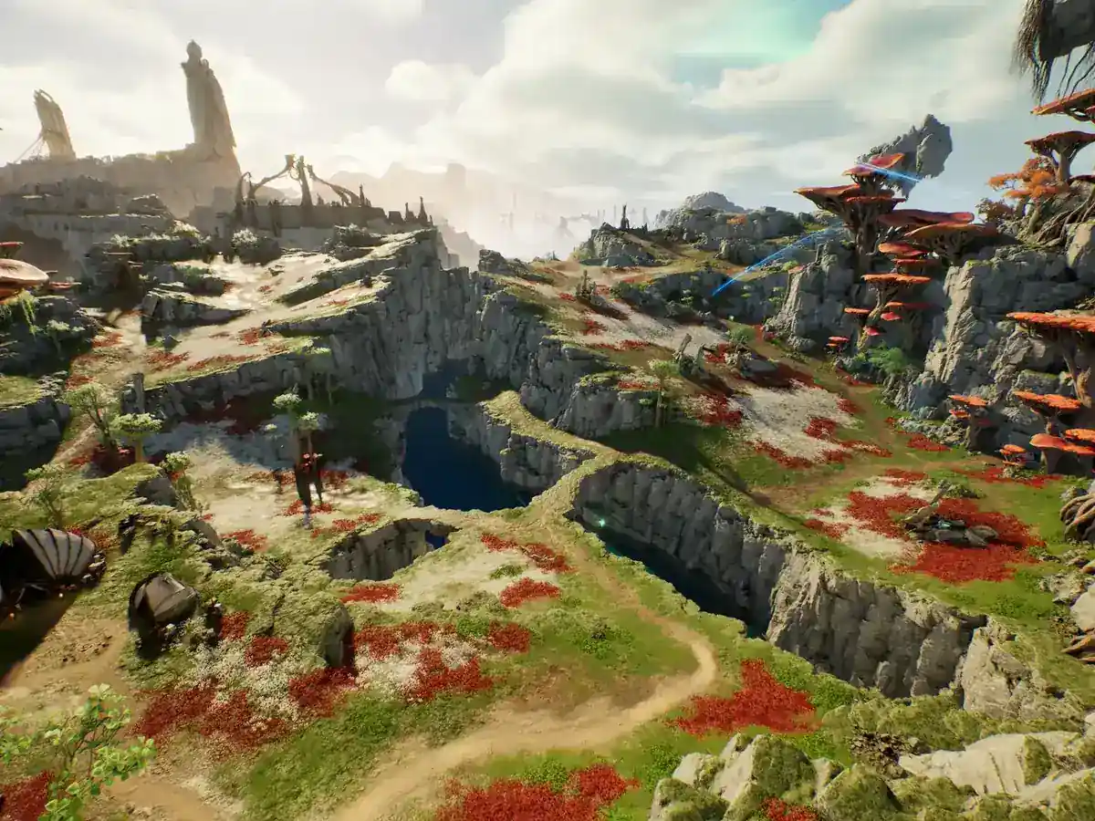 A fantasy landscape has a stone bridge, a cave and large red mushrooms.