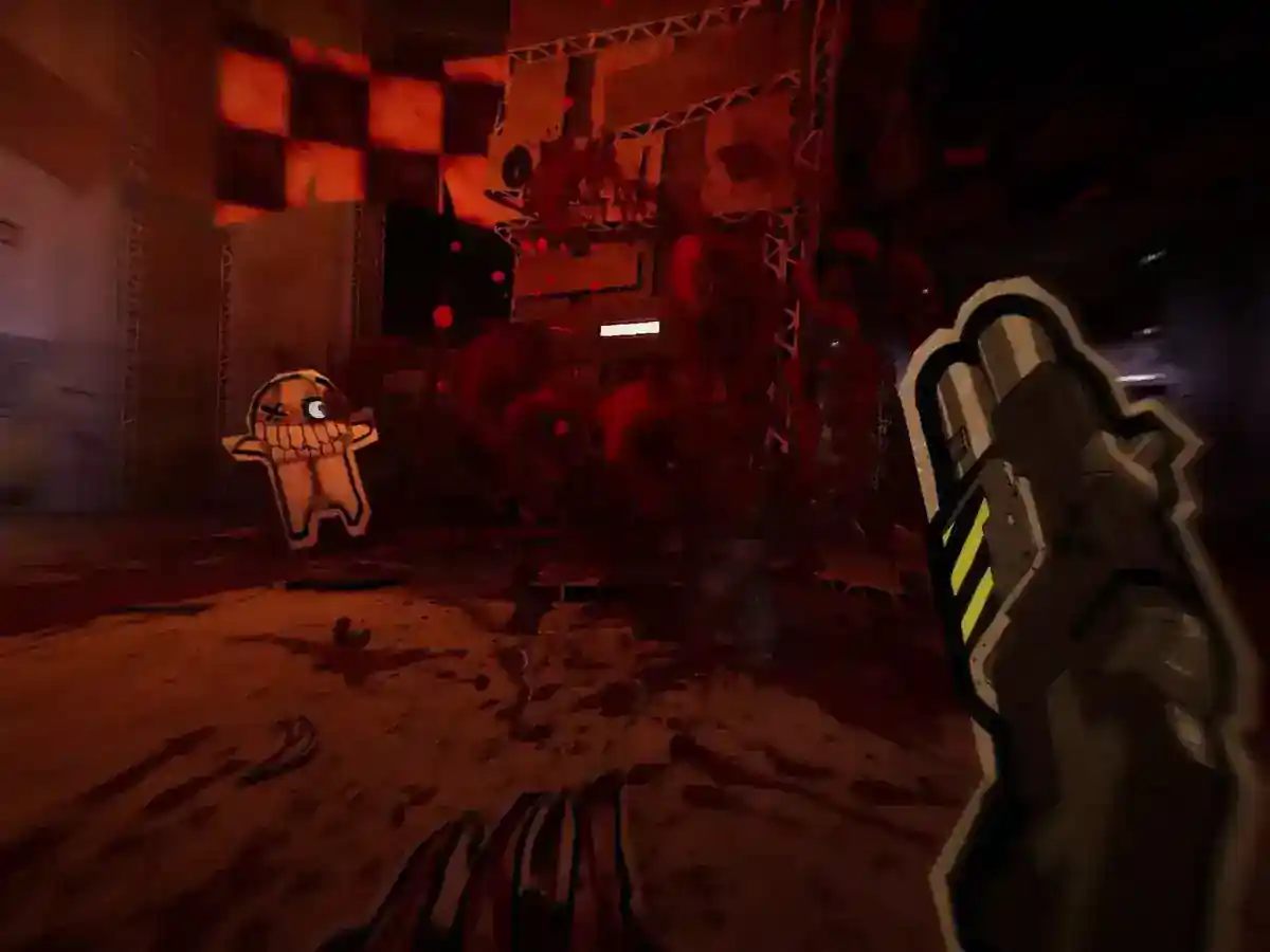 A cardboard figure stands amid red debris as a first-person weapon enters the frame.