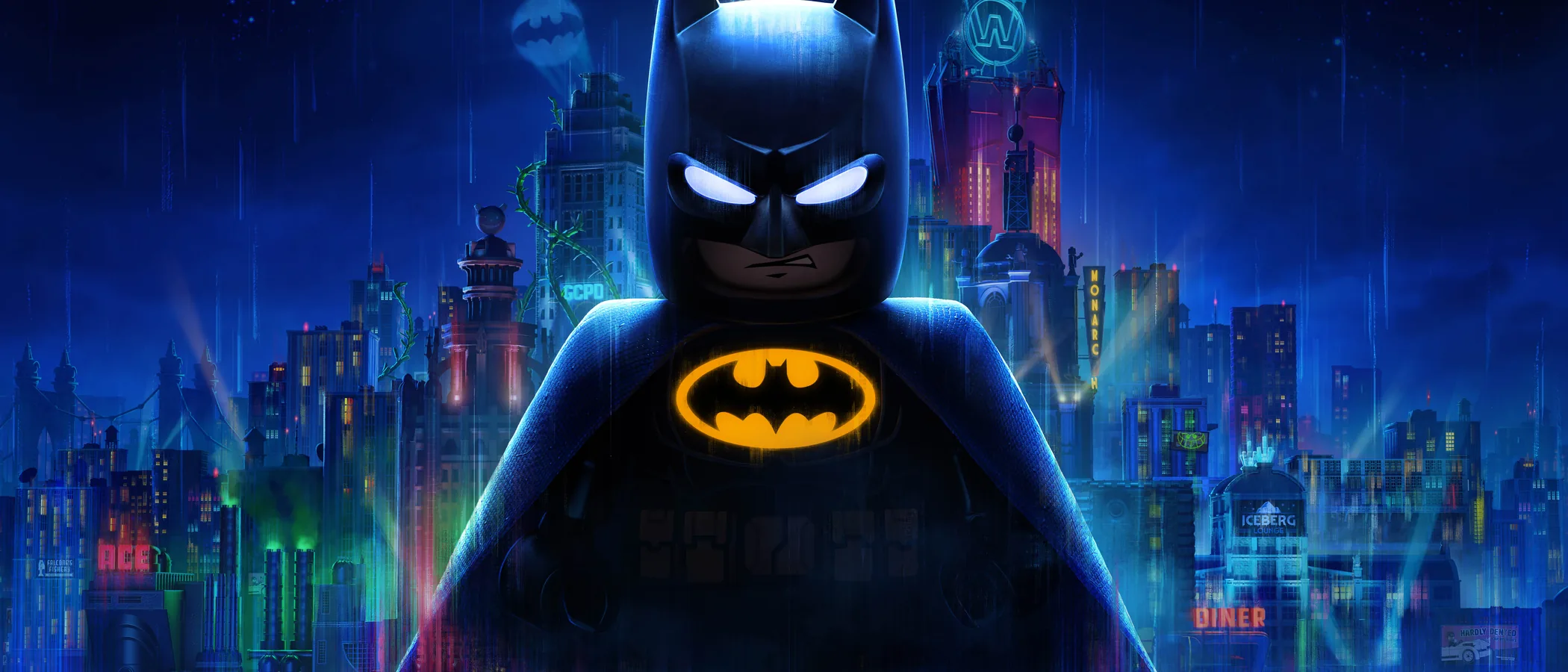 LEGO Batman stands before Gotham's skyline beneath a bright bat signal.