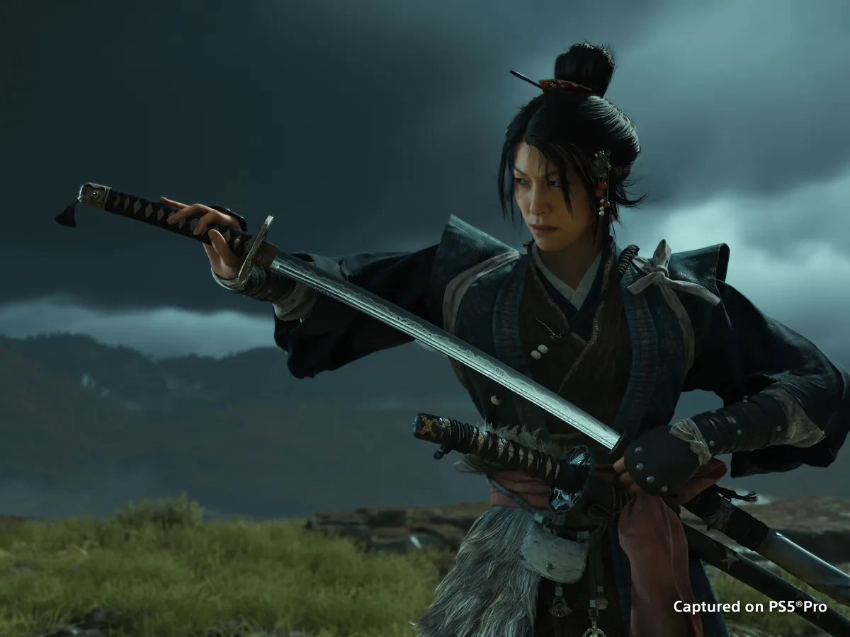 Atsu draws a katana beneath a stormy sky in Ghost of Yotei.