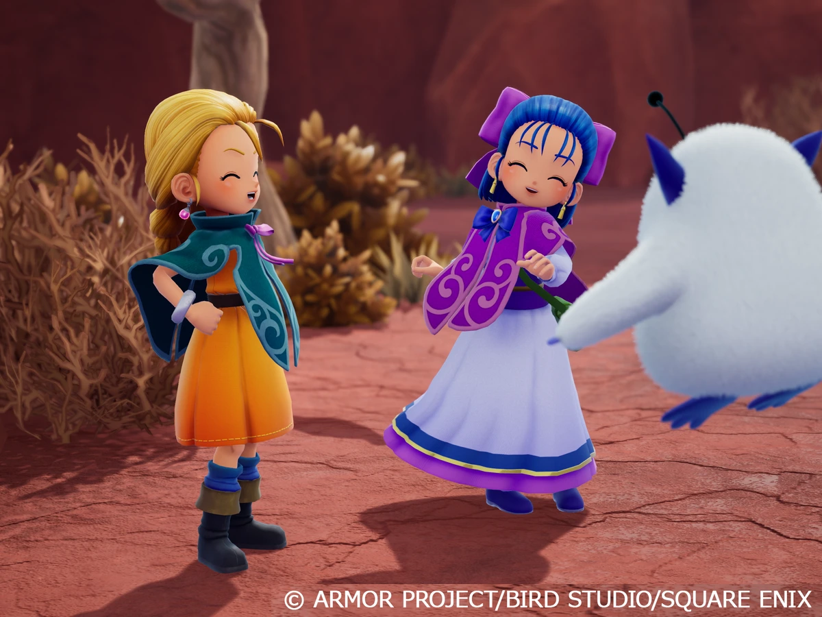 Bianca and Nera smile beside the floating white creature Fluffy in a rocky landscape