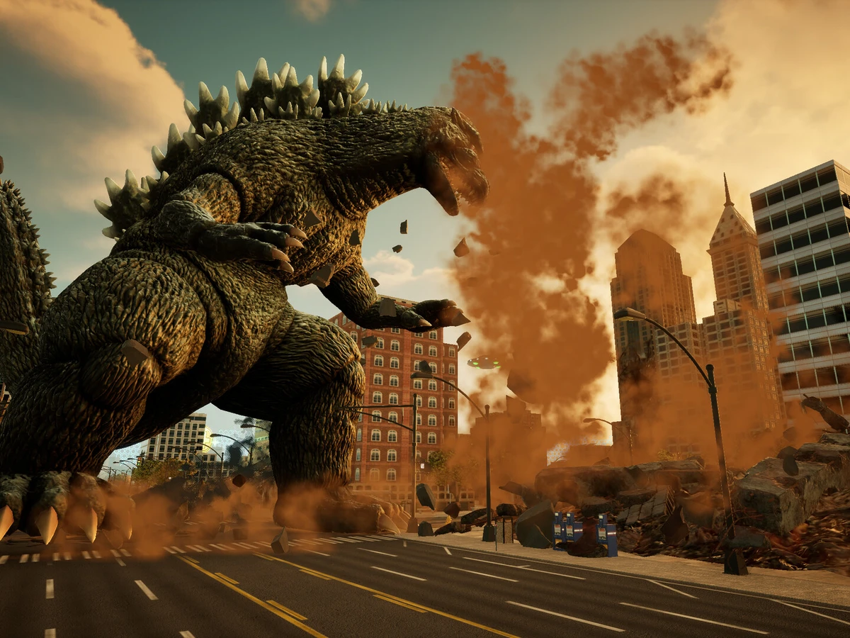 Godzilla raises a foot beside damaged city buildings beneath an orange sky.