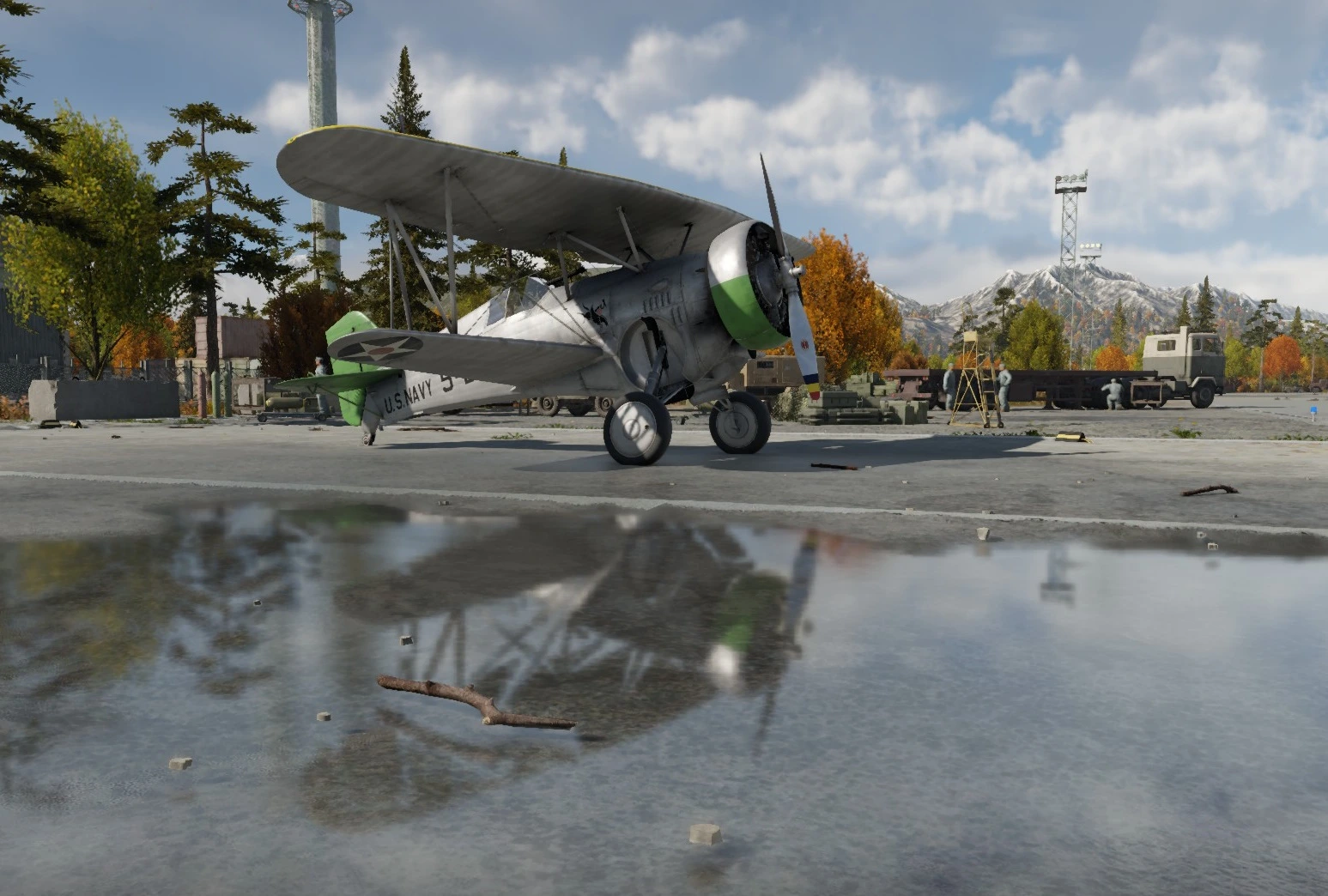 A biplane reflected in a puddle in a historical War Thunder graphics demonstration