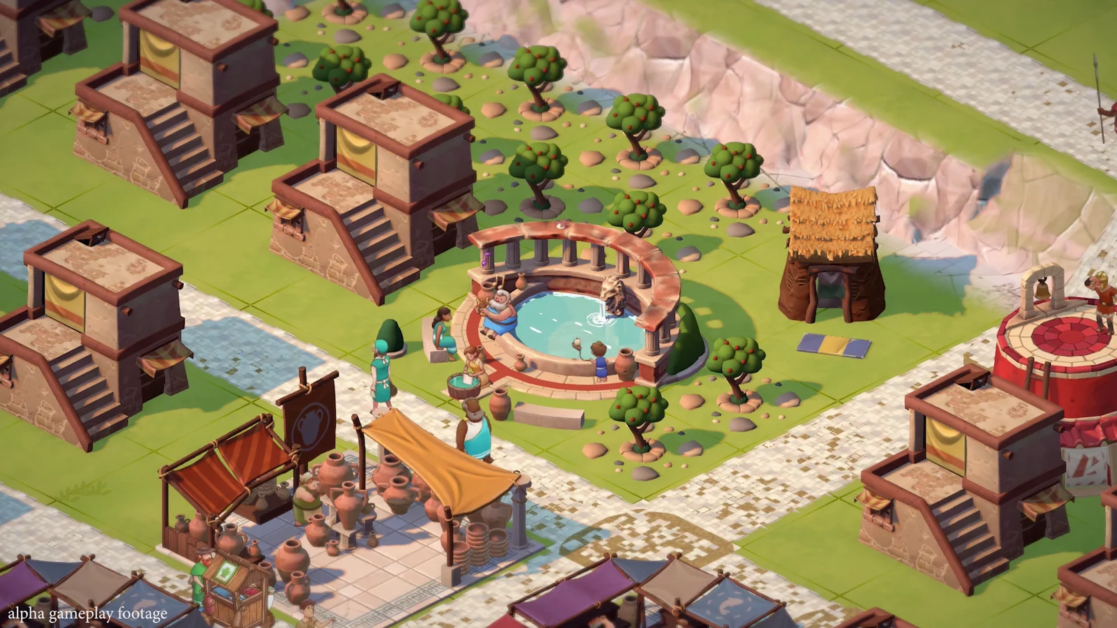 A fountain and market beside homes and paved roads in Theos: Cities of Myth