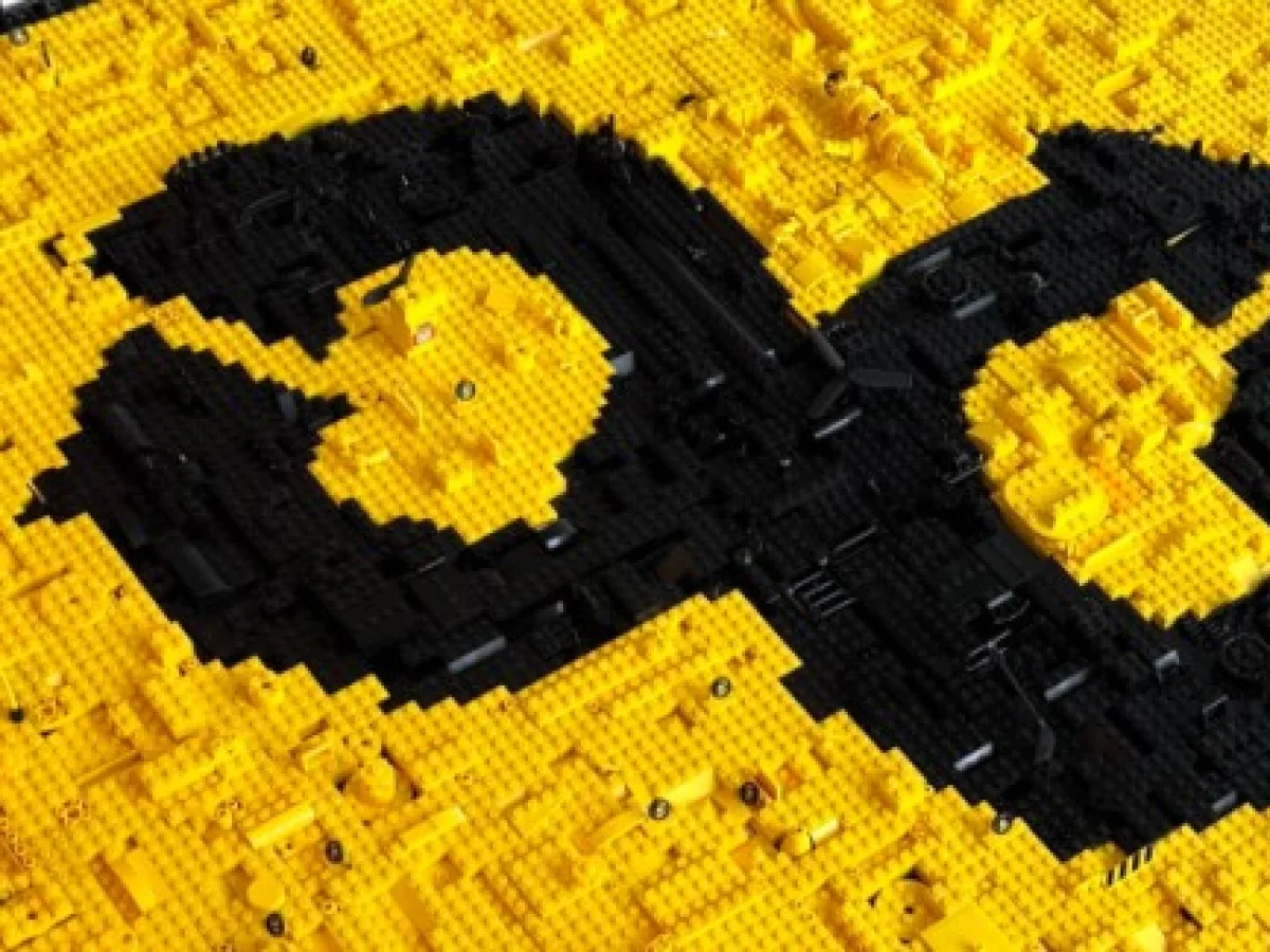Yellow LEGO bricks spelling Offroad in black against a dark background.