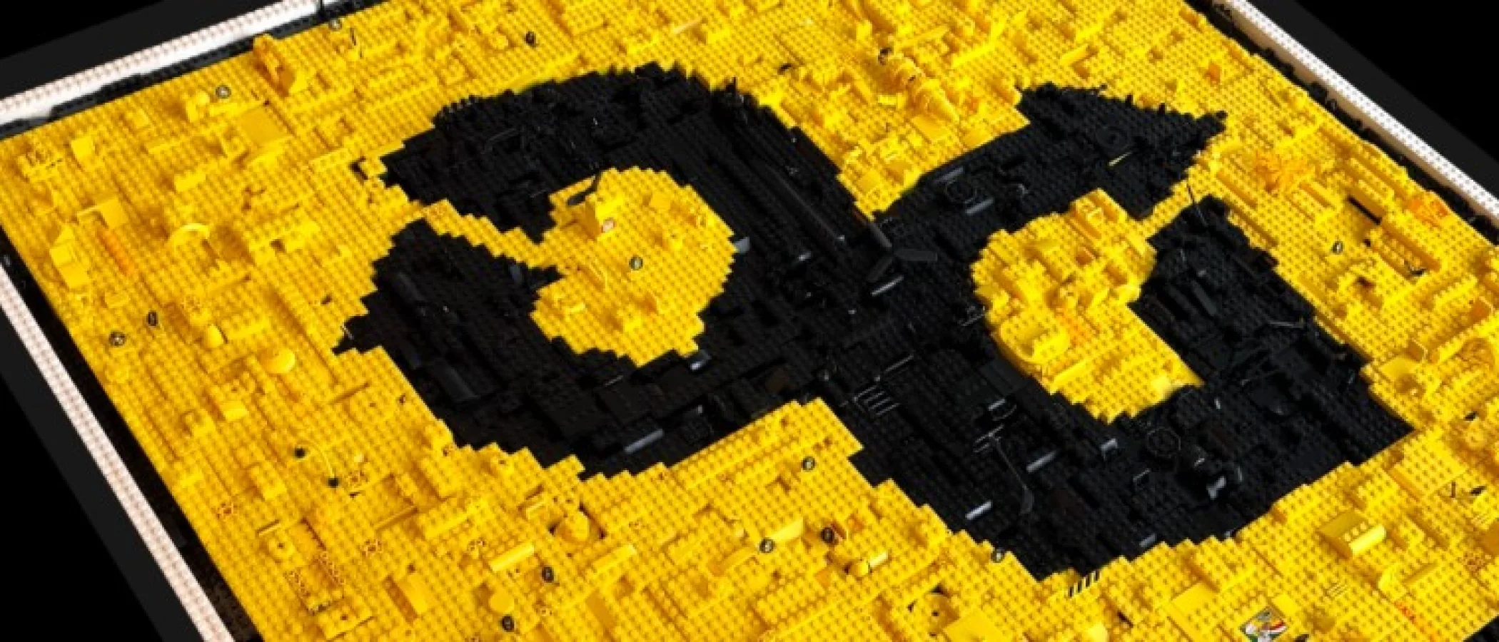 Yellow LEGO bricks spelling Offroad in black against a dark background.