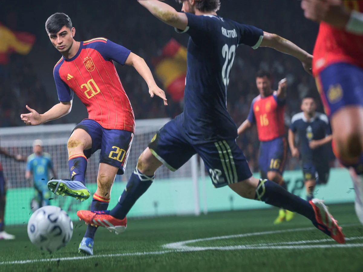 Pedri plays the ball for Spain as a defender steps across his path in FC 27.