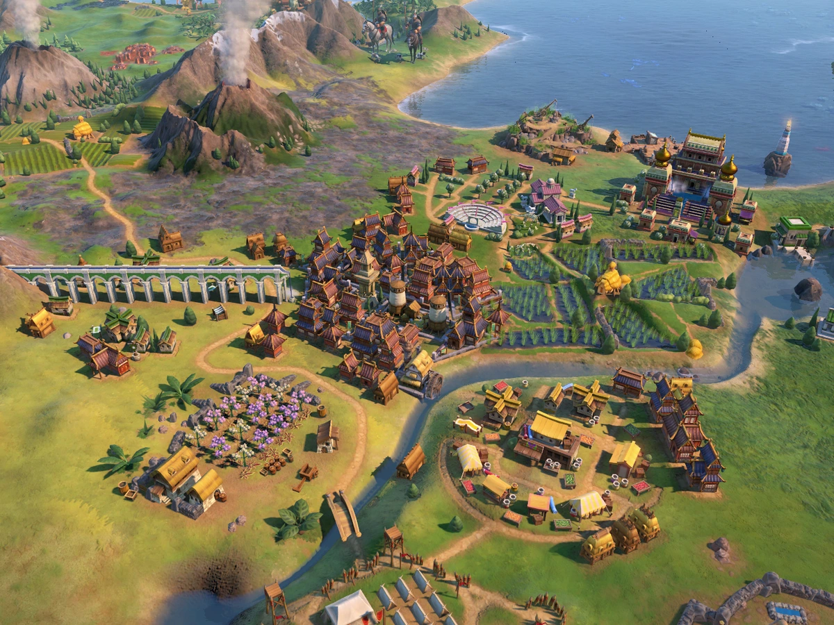Civilization VI city beside a river, volcanic mountains and coastal farmland