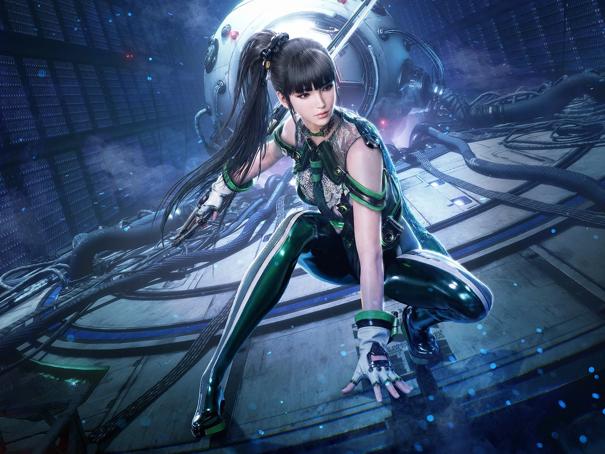 EVE crouches with her blade in a blue-lit circular chamber