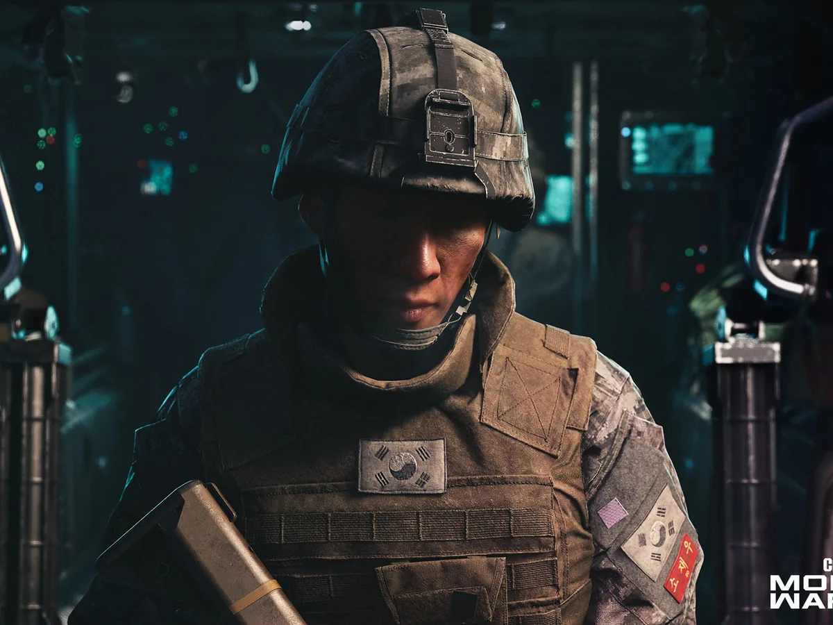 Private Park sits in a military vehicle wearing South Korean uniform in Call of Duty: Modern Warfare 4.