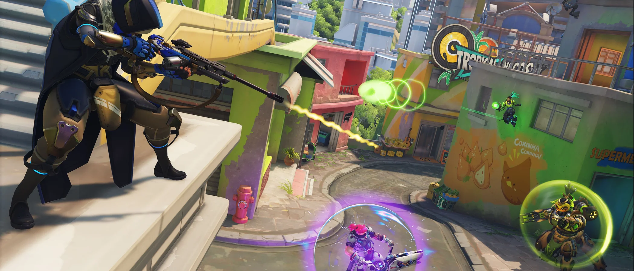 Ana and other Overwatch heroes exchange fire on the streets of Rio.