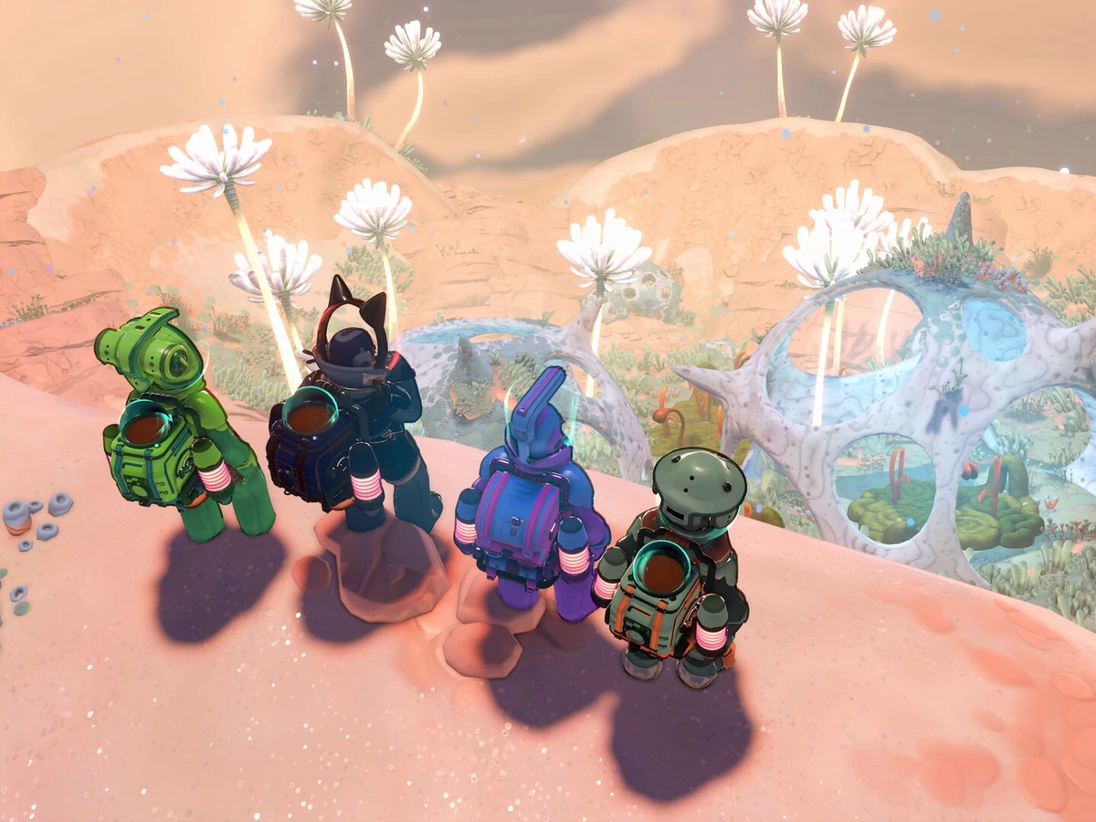 Four suited explorers overlook giant pale plants and an orange moonlet landscape in Young Suns.