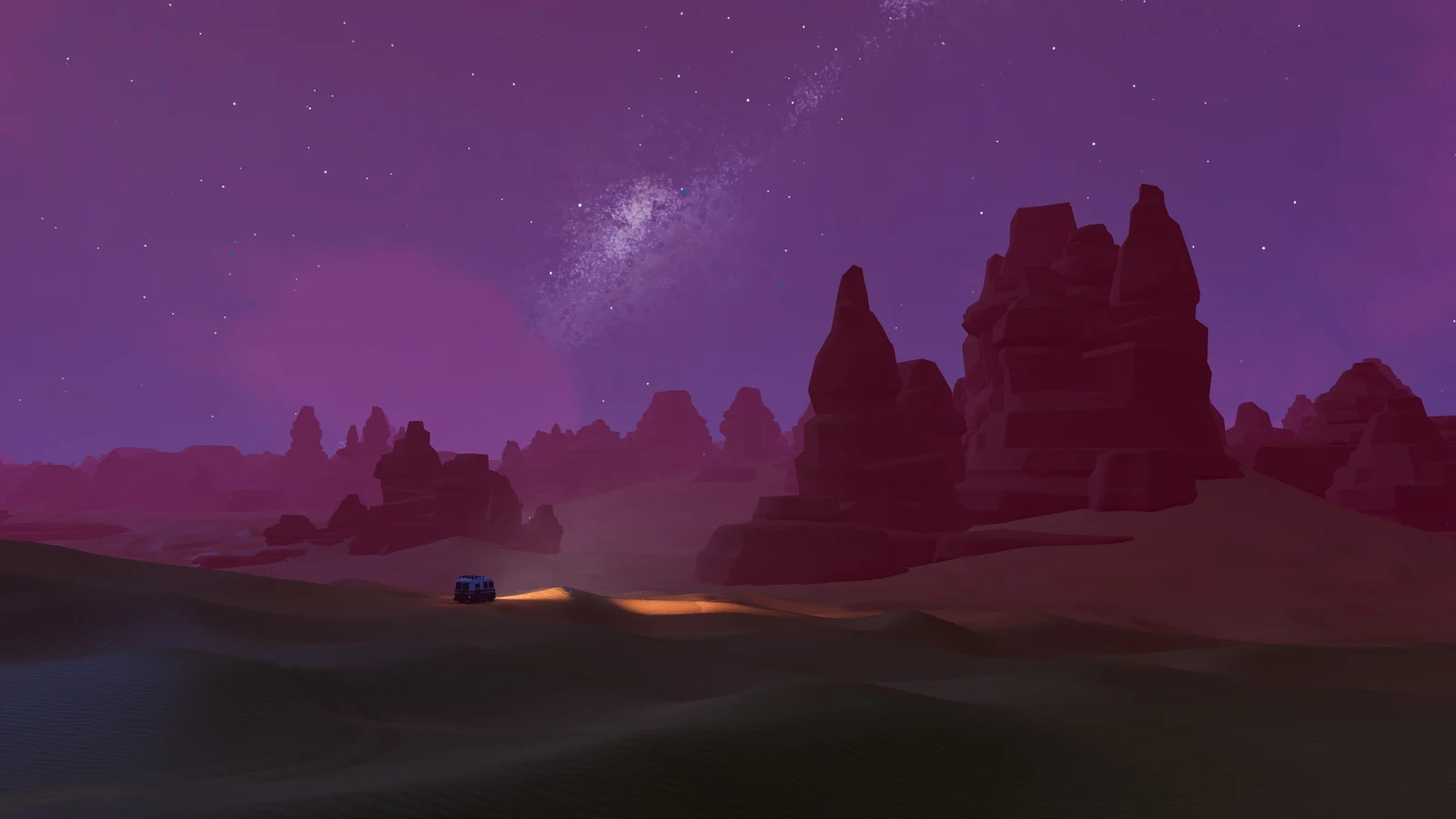 A small off-road vehicle drives between rock formations beneath a starry purple sky