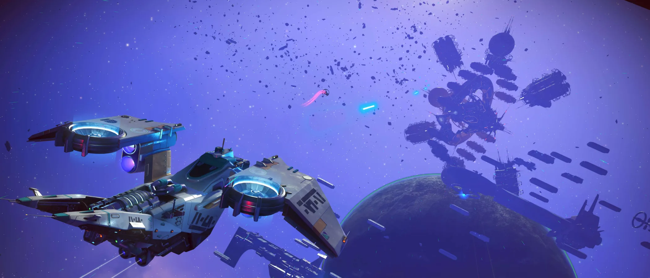 A Corvette-class ship approaches a large space station above a planet in No Man's Sky Cosmos.