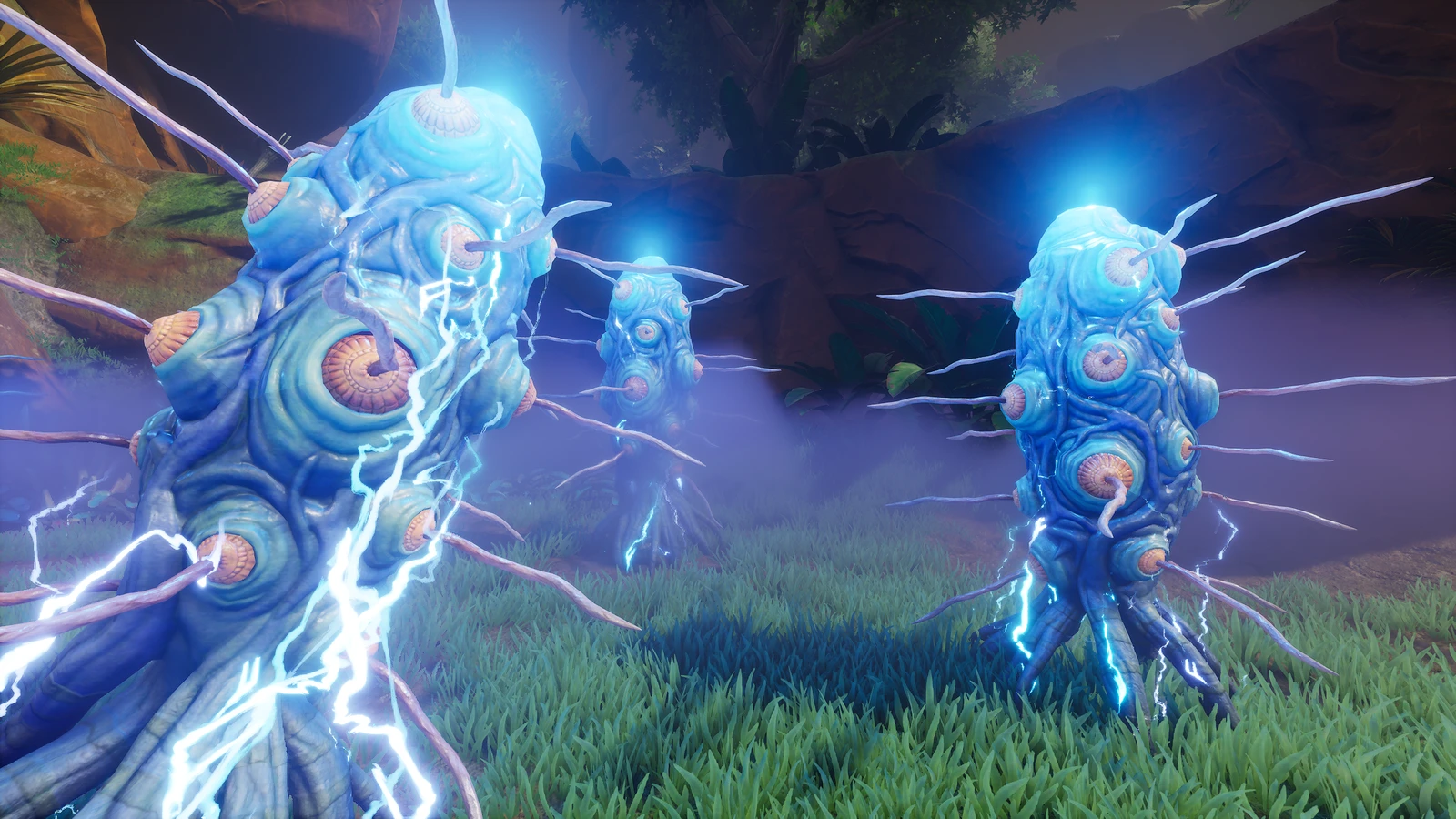 Blue upright organisms with tendrils and electrical arcs stand in a grassy clearing.