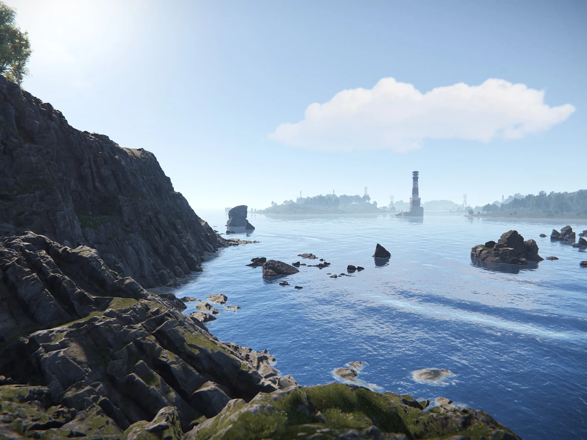 Rocky Rust coastline overlooking water and a distant lighthouse