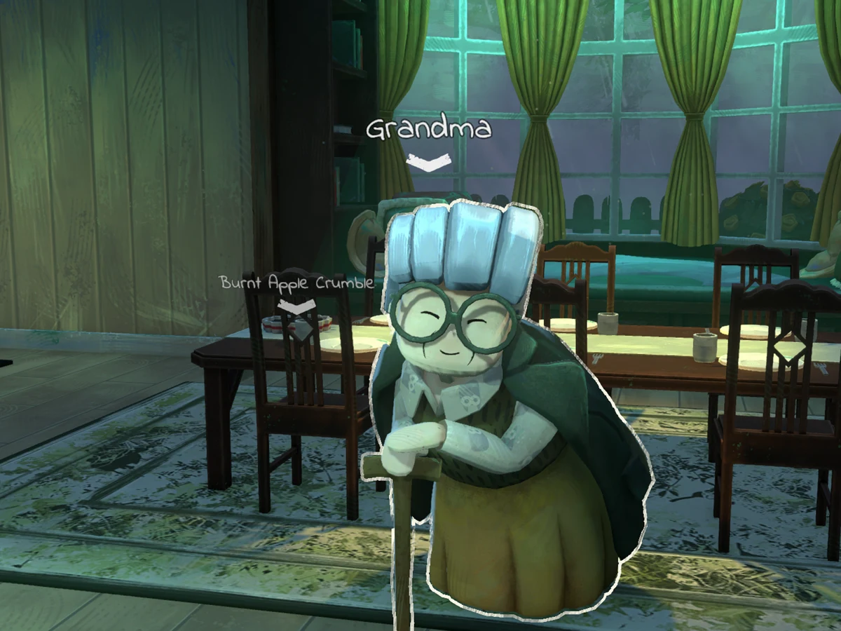 Grandma stands with her walking stick beside the dining table in Apple Crumble.