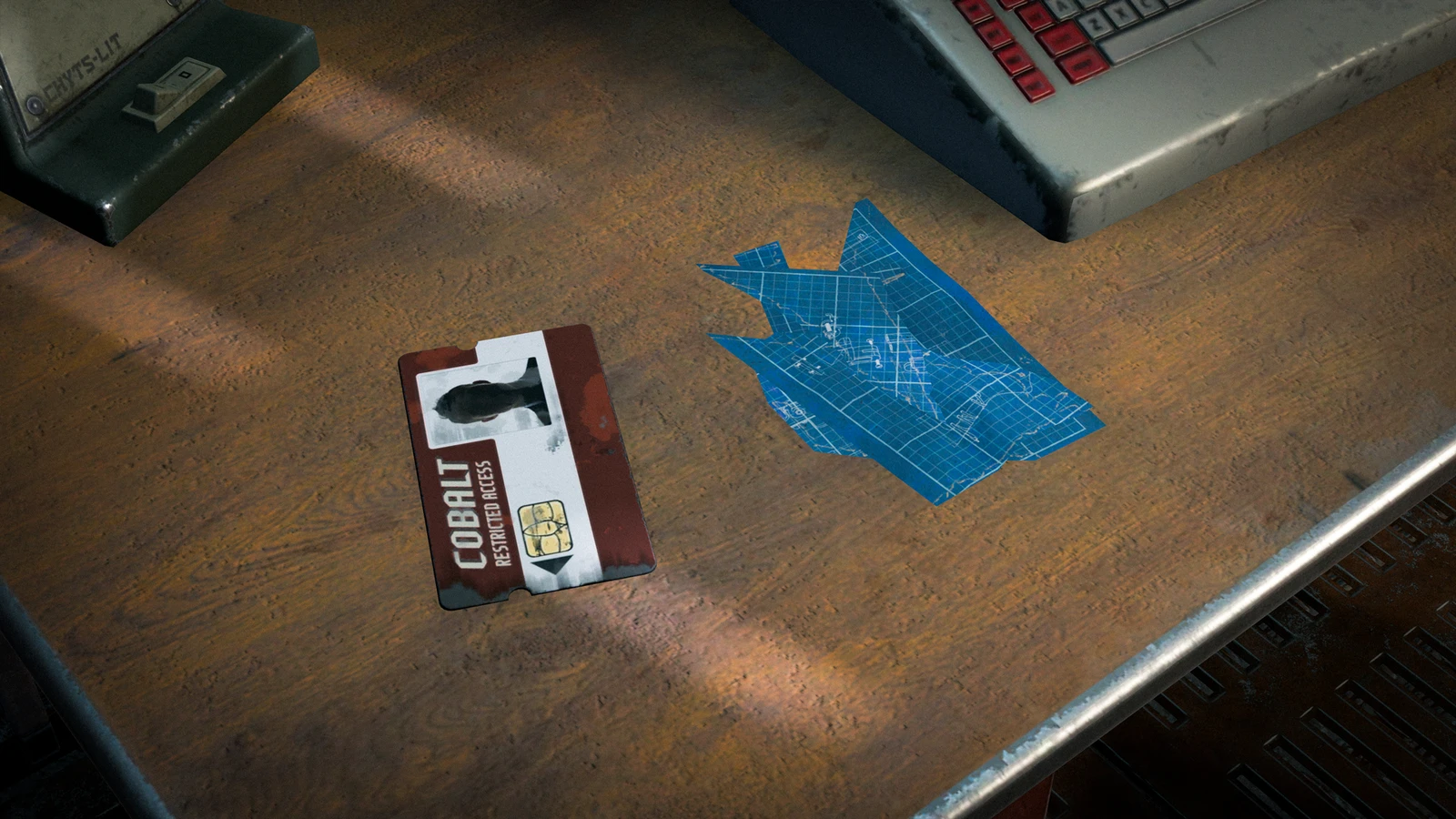 Blueprint fragments lie beside a red Cobalt keycard on a Rust puzzle-room desk.