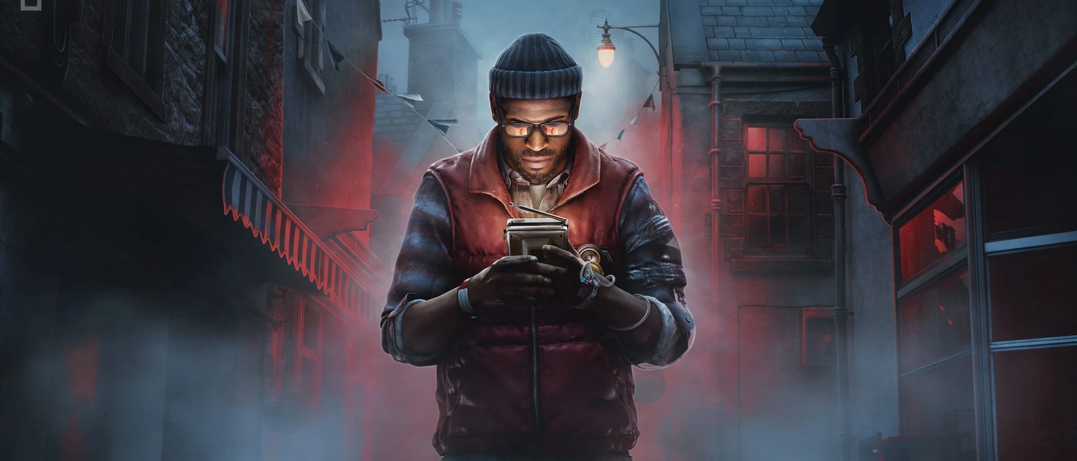 Simon stands in a misty St. Amelia street looking down at a handheld device in Silent Hill: Townfall.