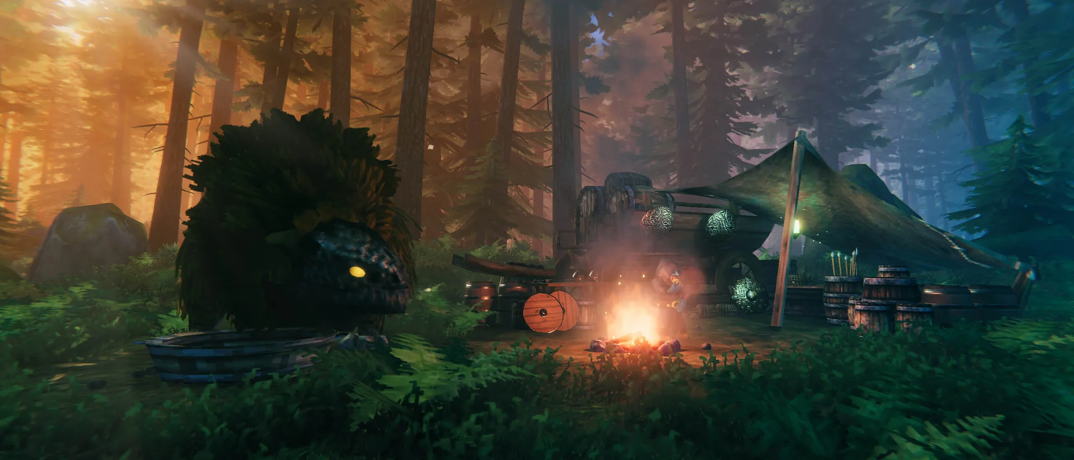 Haldor sits beside a fire at his merchant camp in Valheim's Black Forest, with a lox and tent nearby.