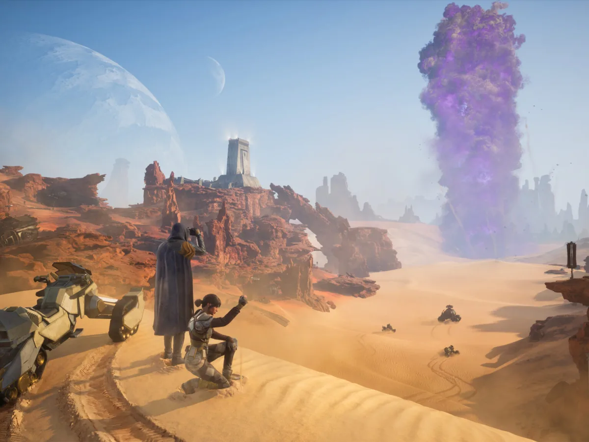 Two figures overlook a rocky desert valley on Arrakis beside a sandbike.