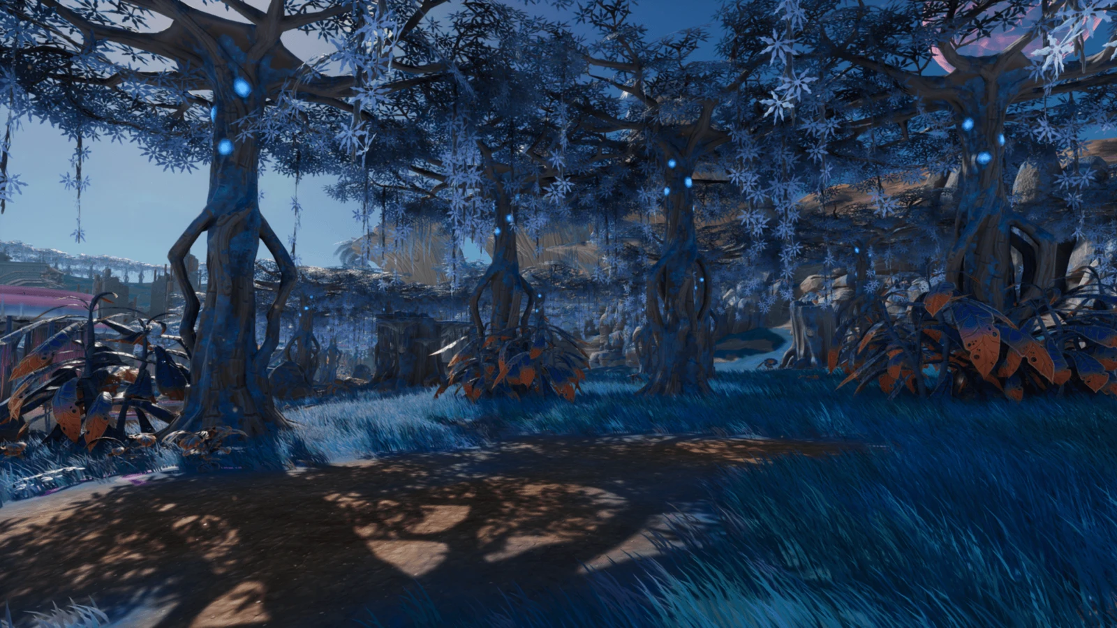 Blue-leaved trees and blue grass fill the shaded Hollow Marsh in Lightyear Frontier.