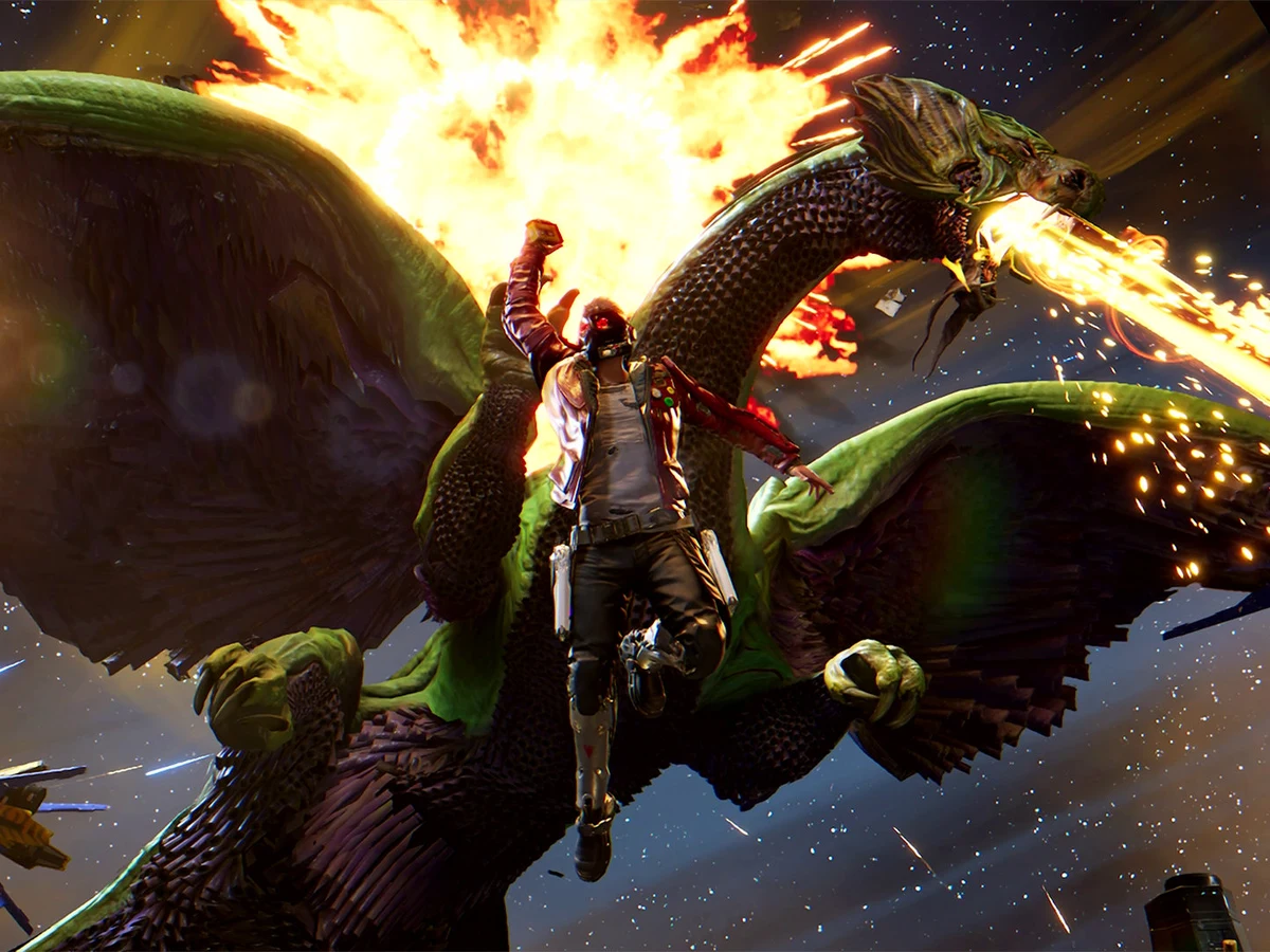 Star-Lord fires his blasters in front of a huge winged creature amid sparks and flames