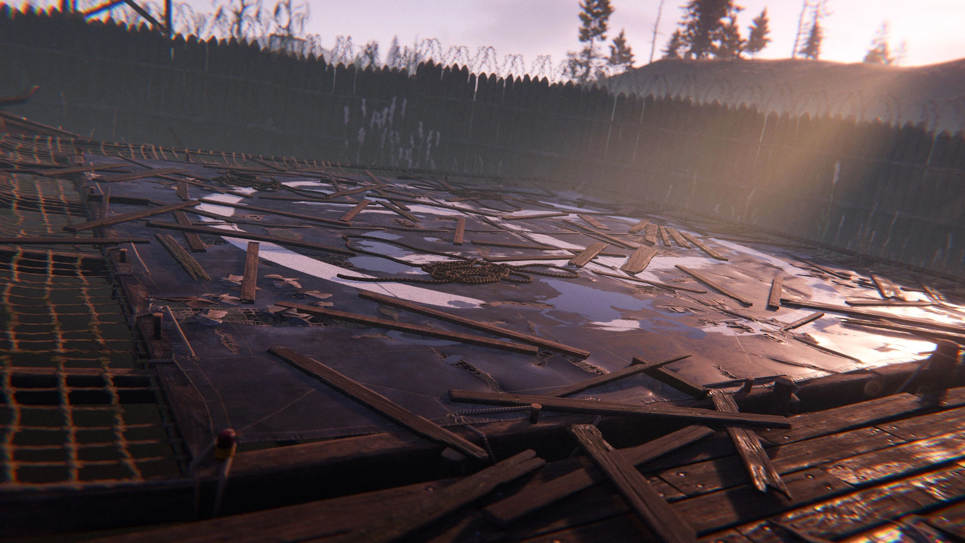 A daylight close-up shows broken boards and loose rope across the Air Wolf helipad landing surface.